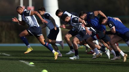 Le XV de France à l'entraînement à Marcoussis avant le match contre l'Ecosse, le 21 février 2023. (ANNE-CHRISTINE POUJOULAT / AFP)