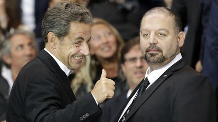 Nicolas Sarkozy dans les tribunes du Parc des Princes &agrave; Paris le 31 ao&ucirc;t 2014&nbsp;pour le match entre le PSG et Saint-Etienne. (KENZO TRIBOUILLARD / AFP)