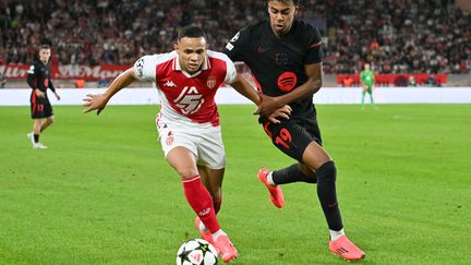 Brazilian defender Vanderson facing Lamine Yamal during the match against FC Barcelona in the Champions League, September 19, 2024, at the Louis II stadium. (MIGUEL MEDINA / AFP)