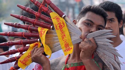 Depuis, la communaut&eacute; chinoise de Phuket attribue au v&eacute;g&eacute;tarisme toute sorte de vertus et c&eacute;l&egrave;bre ce comportement alimentaire chaque ann&eacute;e. (PORNCHAI KITTIWONGSAKUL / AFP)