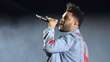 Le chanteur de R'n'b et électro The Weeknd a joliment conclu le premier jour du Lollapalooza, avec une scénique à l'esthétique minimaliste et efficace.
 (SADAKA EDMOND / SIPA)