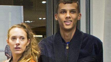 La styliste Coralie Barbier et Stromae lors de la Fashion Week parisienne le 3 décembre 2014
 (GEOFFROY VAN DER HASSELT / BELGA MAG / BELGA/AFP)