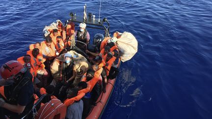 Migrants rescued by the French NGO Ocean Viking off the Italian coast, June 30, 2020. (SHAHZAD ABDUL / AFP)