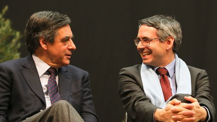 François Fillon et Vincent Chriqui, le 12 février 2014, à Bourgoin-Jallieu (Isère). (MICHEL THOMAS / MAXPPP)