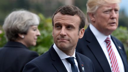 Theresa May, Emmanuel Macron et Donald Trump au sommet du G7 à Taormina (Italie), le 26 mai 2017. (REUTERS)