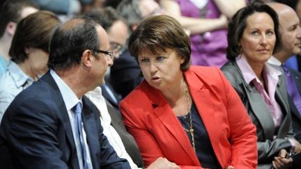 Martine Aubry (au centre), François Hollande (à gauche), Ségolène Royal (à droite): qui va l'emporter ? (AFP - BERTRAND GUAY)