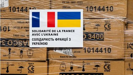 Des palettes de dons destinés à l'Ukraine en provenance de France. (HANS LUCAS via AFP)