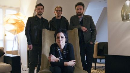 Les membres du groupe The Cranberries : Mike Hogan, Fergal Lawler et Noel Hogan à Paris le 18 janvier 2012. La chanteuse Dolores O'Riordan est morte en janvier 2018. (JOEL SAGET / AFP)