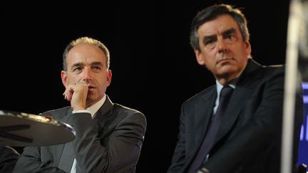 Le pr&eacute;sident de l'UMP, Jean-Fran&ccedil;ois Cop&eacute; (G), et l'ancien Premier ministre, Fran&ccedil;ois Fillon, lors d'un meeting &agrave; Strasbourg (Bas-Rhin), le 5 mars 2014. (POL EMILE / SIPA)