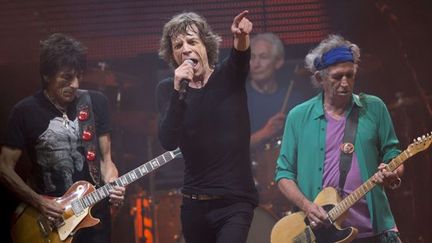 Les Rolling Stones le 29 juin 2013 sur scène à Glastonbury (Ron Wood, Mick Jagger, Charlie Watts et Keith Richards).
