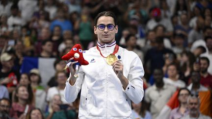 Le para nageur français Ugo Didier vainqueur de la médaille d'or en 400 mètres S9 des Jeux paralympiques de Paris, le 29 août 2024. (HERVIO JEAN-MARIE / AFP)