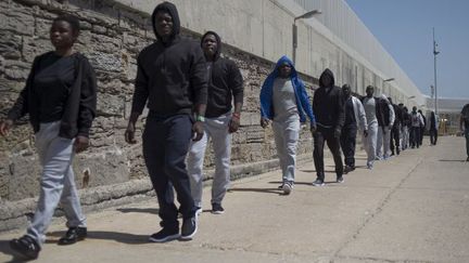 Migrants à leur arrivée à Tarifa (sud de l'Espagne) le 14 juillet 2018. (JORGE GUERRERO / AFP)