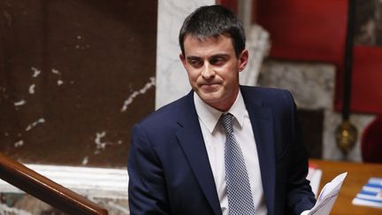 Manuel Valls quitte la tribune de l'Assembl&eacute;e nationale, apr&egrave;s avoir prononc&eacute; son discours de politique g&eacute;n&eacute;rale, le 8 avril 2014. (PATRICK KOVARIK / AFP)