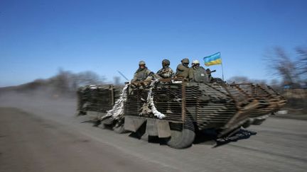 &nbsp; (L'Ukraine ne désarmera pas ses soldats postés dans le Donbass malgré les accords de Minsk 2 © Reuters-Gleb Garanich)