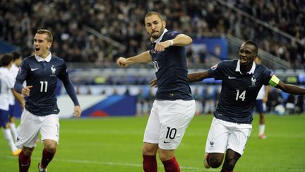 Les Fran&ccedil;ais Antoine Griezmann, Karim Benzema et Blaide Matuidi lors du match France-Portugal, le 11 octobre 2014 au Stade de France de Saint-Denis. (JEAN MARIE HERVIO / DPPI MEDIA / AFP)