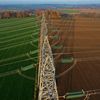 Une vue aérienne de pylônes électriques, à Saint-Laurent-de-Terregatte (Manche), le 6 décembre 2022. (DAMIEN MEYER / AFP)