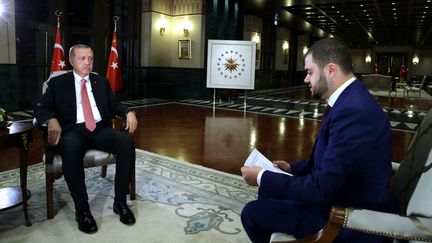 Le président turc Recep Tayyip Erdogan lors d'une interview accordée à la chaîne A-Jazeera, le 20 juillet 2016. (TURKISH PRESIDENCY / MURAT CETIN / ANADOLU AGENCY / AFP)