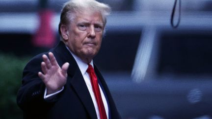 Donald Trump leaves Manhattan federal court in New York, where he was convicted of defamation, on January 26, 2024. (CHARLY TRIBALLEAU / AFP)