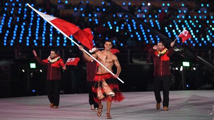 Pita Taufatofua lors de la cérémonie d’ouverture des Jeux olympiques d’hiver à Pyeongchang, le 9 février 2018. (KIRILL KUDRYAVTSEV / AFP)