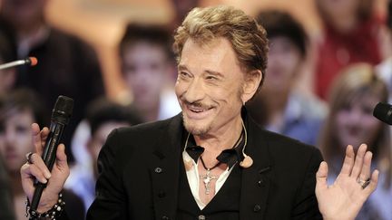 Johnny Hallyday, lors de l'&eacute;mission "Le Grand Journal", sur Canal +, le 28 mars 2011. (BERTRAND GUAY / AFP)