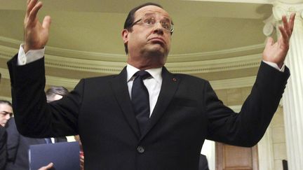 Le pr&eacute;sident fran&ccedil;ais Fran&ccedil;ois Hollande r&eacute;agit &agrave; l'issue de sa conf&eacute;rence de presse en compagnie du Premier ministre grec &agrave; Ath&egrave;nes (Gr&egrave;ce), le 19 f&eacute;vrier 2013. (REUTERS)