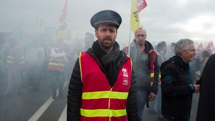 Des manifestants contre la réforme des retraites, le 17 décembre 2019, à Toulouse (Haute-Garonne). (FREDERIC SCHEIBER / HANS LUCAS / AFP)