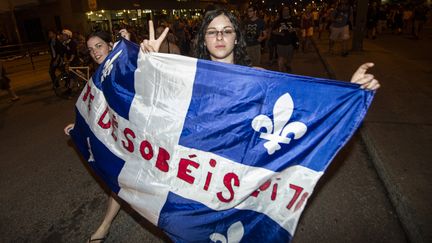 Manifestation &agrave; Montr&eacute;al (Qu&eacute;bec) contre la hausse des frais de scolarit&eacute; &agrave; l'universit&eacute;, le 24 mai 2012. (ROGERIO BARBOSA / AFP)