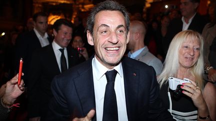 L'ancien pr&eacute;sident de la R&eacute;publique, Nicolas Sarkozy, arrive au concert de sa femme, Carla Bruni, le 6 d&eacute;cembre 2013 au casino de Monte-Carlo. (MAXPPP)