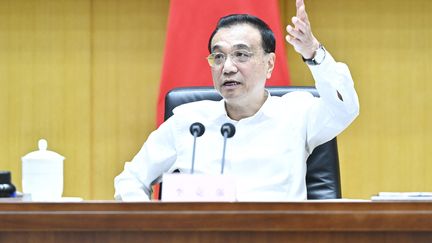 Le Premier ministre chinois&nbsp;Li Keqiang donne une conférence de presse à Pékin, le 25 mai 2022. (YAN YAN / XINHUA / AFP)