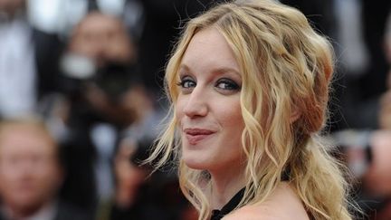 Ludivine Sagnier sur les marches du Palais des festival pour le film de clôture du 64e Festival de Cannes, &quot;Les bien aimés&quot;.
 (ANNE-CHRISTINE POUJOULAT/AFP)