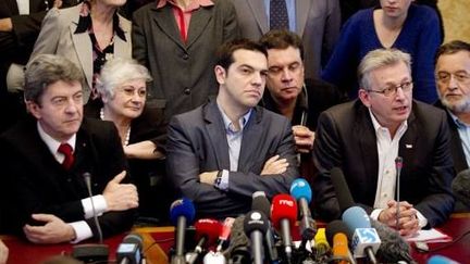 Jean-Luc Mélenchon, Alexis Tsipras et Pierre Laurent (JOEL SAGET / AFP)