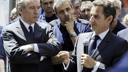 François Bayrou et Nicolas Sarkozy en juin 2010 à Bordes (AFP PHOTO / POOL / JEAN-PIERRE MULLER)