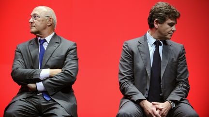 Michel Sapin (&agrave; gauche) et Arnaud Montebourg, le 24 septembre 2013, &agrave; Bordeaux.&nbsp; (NICOLAS TUCAT / AFP)