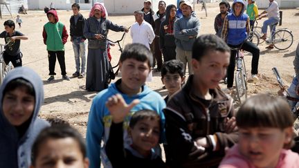 Des réfugiés syriens dans le camp de Zaatari, à la frontière jordanienne, en mars 2017.&nbsp; (THOMAS COEX / AFP)