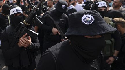 Des combattants de la "Fosse aux lions" à Naplouse, en Cisjordanie occupée, le 23 octobre 2022. (JAAFAR ASHTIYEH / AFP)