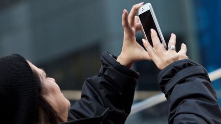 &nbsp; (Les applications d'échange de photos se multiplient. © REUTERS/Andrew Burton)