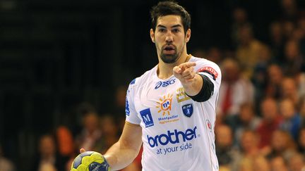 La soci&eacute;t&eacute; Brother a rompu son contrat avec Nikola Karabatic et avec le club de handball de Montpellier, mercredi 17 octobre 2012. (BENJAMIN NOLTE / AFP)