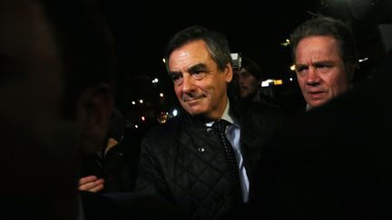 La mine satisfaite, François Fillon arrive à son QG de campagne, le 20 novembre 2016, au soir du premier tour de la primaire à droite.&nbsp; (THIBAULT CAMUS / AFP)