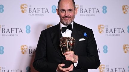 Le réalisateur allemand Edward Berger, meilleur réalisateur aux Bafta 2023 pour "A l'Ouest, rien de nouveau", meilleur film (19 février 2023) (JUSTIN TALLIS / AFP)