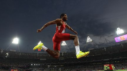 L'Am&eacute;ricain&nbsp;Christian Taylor lors de l'&eacute;preuve de triple saut, le 9 ao&ucirc;t 2012 aux JO de Londres.&nbsp; (ADRIAN DENNIS / AFP)