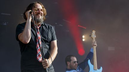 Le chanteur Karl Tremblay, du groupe de rock québécois Les Cowboys Fringants, au Paléo Festival, à Nyon (Suisse), le 23 juillet 2019. (SALVATORE DI NOLFI / KEYSTONE / EPA / MAXPPP)