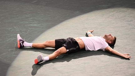 Filip Krajinovic après sa victoire face à John Isner. (CHRISTOPHE SIMON / AFP)