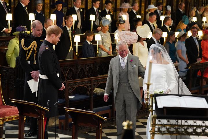 Meghan Markle arrive accompagnée du Prince Charles, Prince of Wales à la St George's Chapel, le 19 mai 2018.&nbsp; (JONATHAN BRADY / POOL)