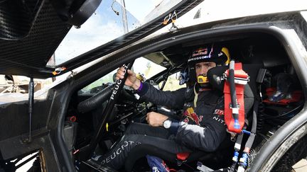 La première place de Stéphane Peterhansel (Peugeot 2008 DKR) est-elle menacée par la plainte de Mini ? (FRANCK FIFE / AFP)