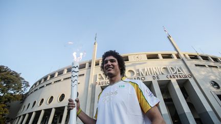 Anderson Varejao avait eu l'honneur de porter la flamme olympique. (GABRIELA BILO)