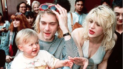 Kurt Cobain, Courtney Love, et leur fille, en 1993. (REX FEATURES / SIPA)