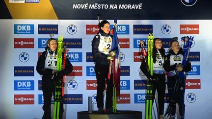 From left to right, Justine Bresaz-Bouchet (2nd), Julia Simon (1st), Lou Jeanmonot (3rd) and Sophie Chauveau (4th) during the sprint podium in Nové Mesto on Friday, February 9 (Michael Cizek/AFP)