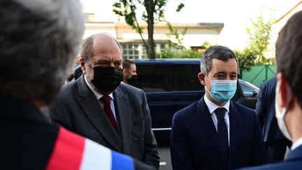 Eric Dupond-Moretti&nbsp;et Gérald Darmanin, à Saint-Denis, le 28 mai 2021. (MARTIN BUREAU / AFP)