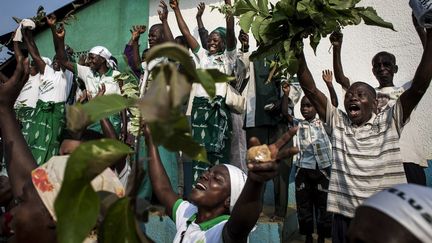 Des fidèles de l'église kimbanguiste&nbsp;lors de la célébration de Noël, le 25 mai 2017, à Nkamba, en RDC. (JOHN WESSELS / AFP)