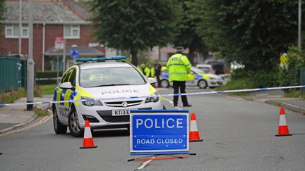 Un barrage de police dans le quartier de Keyham, à Plymouth (Royaume-Uni), au lendemain d'une fusillade, le 13 août 2021. (MAXPPP)